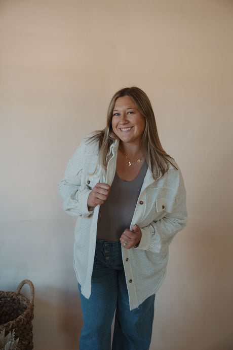 front view of model wearing the never be the same shacket. model has the shacket paired with the change your mind bodysuit in the color smoky taupe.