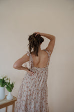 Load image into Gallery viewer, close back view of model wearing the everything could change dress. model has the dress paired with the anna necklace.