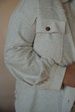 Load image into Gallery viewer, detail view of model wearing the never be the same shacket. model has the shacket paired with the change your mind bodysuit in the color smoky taupe.