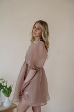 Load image into Gallery viewer, side view of model wearing the wherever you go dress. model has the dress paired with the dainty mallory necklace.