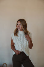 Load image into Gallery viewer, front view of model wearing the all we knew sweater. model has the sweater paired with the addison denim in the color brown.