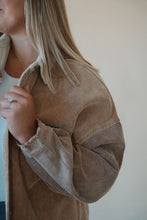 Load image into Gallery viewer, detail view of model wearing the all we could be jacket. model has the sweater paired with the change your mind bodysuit in the color white.