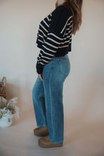 Load image into Gallery viewer, side view of model wearing the lawson denim.