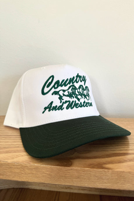country and western evergreen and cream two tone trucker hat.