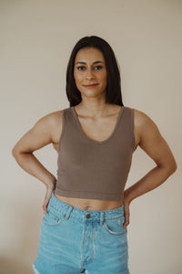 front view of model wearing the stay the same top in the color walnut. model has the top paired with the boston denim shorts.
