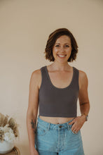 Load image into Gallery viewer, front view of model wearing the stay the same top in the color charcoal. model has the top paired with the boston denim shorts.