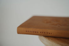 Load image into Gallery viewer, side binding view of the hosanna revival lined notebook in the Amelia theme.