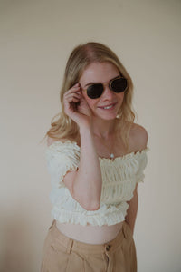 model wearing the alex sunglasses.