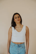 Load image into Gallery viewer, front view of model wearing the stay the same top in the color white. model has the top paired with the boston denim shorts.