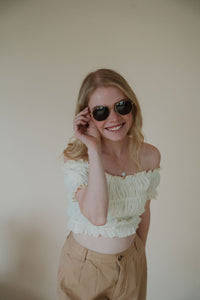 model wearing the alex sunglasses.