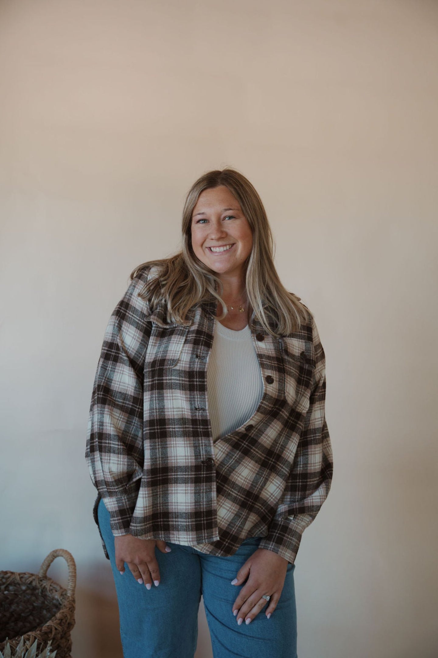 front view of model wearing the something's changed shacket. model has the shacket paired with the forever yours top in the color light beige.