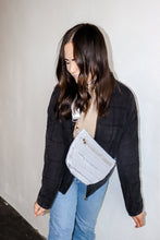 Load image into Gallery viewer, model wearing the it girl crossbody in the color grey.