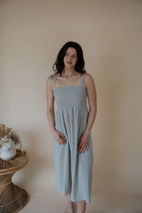 front view of model wearing the starting over dress