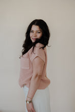Load image into Gallery viewer, side view of model wearing the nothing to prove top in the color dusty pink. model has the top paired with the all over again cream denim midi skirt.