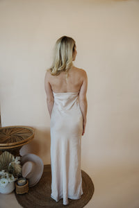 back view of model wearing the we meet again dress.