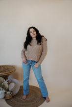 Load image into Gallery viewer, front view of model wearing the Hartford denim. model has the denim paired with the somewhere in the middle sweater in the color oat.