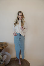 Load image into Gallery viewer, front view of model wearing the as long as I live denim midi skirt. model has the skirt paired with the halfway there top.