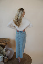Load image into Gallery viewer, back view of model wearing the as long as I live denim midi skirt. model has the skirt paired with the halfway there top.