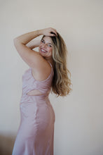 Load image into Gallery viewer, side view of model wearing the sweet romance midi dress.