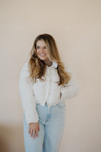 Load image into Gallery viewer, front view of model wearing the time after time puffer in the color ivory. model has the puffer paired with the all along top in the color almond and the camden denim.