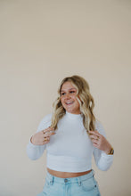 Load image into Gallery viewer, front view of model wearing the after all top in the color white. model has the top paired with the camden denim.