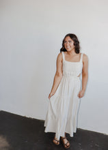 Load image into Gallery viewer, model wearing the on the bay maxi dress. model has the dress paired with a pair of neutral flatbed sandals.