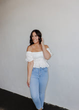 Load image into Gallery viewer, model wearing the wish you the best top. model has the top paired with a pair of light wash denim.