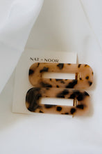 Load image into Gallery viewer, ophelia barrettes in the color tortoise. barrettes are shown attached to an accessory card laid on top of a white sheet.