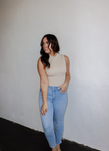 Load image into Gallery viewer, model wearing the nowhere to be top. model has the top paired with a pair of light wash denim.