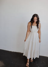 Load image into Gallery viewer, model wearing the on the bay maxi dress. model has the dress paired with a pair of neutral flatbed sandals.