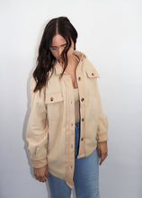 Load image into Gallery viewer, model wearing the until then jacket. model has the jacket paired with a pair of denim and is looking downward.