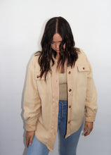 Load image into Gallery viewer, model wearing the until then jacket. model has the jacket paired with a pair of denim and is looking downward.