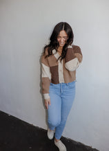 Load image into Gallery viewer, model wearing the day by day cardigan. model has the sweater paired with a pair of lightwash denim and platform sneakers.