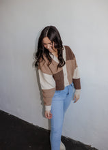 Load image into Gallery viewer, model wearing the day by day cardigan. model has the sweater paired with a pair of lightwash denim and platform sneakers.