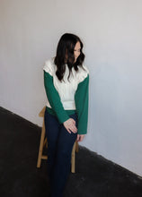 Load image into Gallery viewer, model wearing the all my days sweater vest paired with the take me away top in the color deep green. model has the tops paired with the siena denim.
